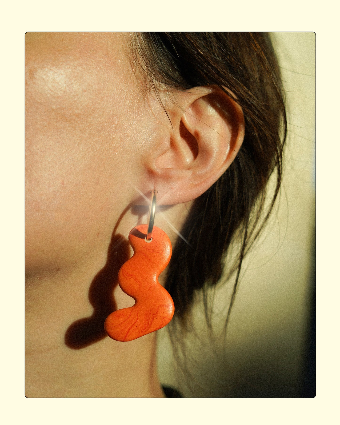 ARCH EARRINGS IN TANGERINE