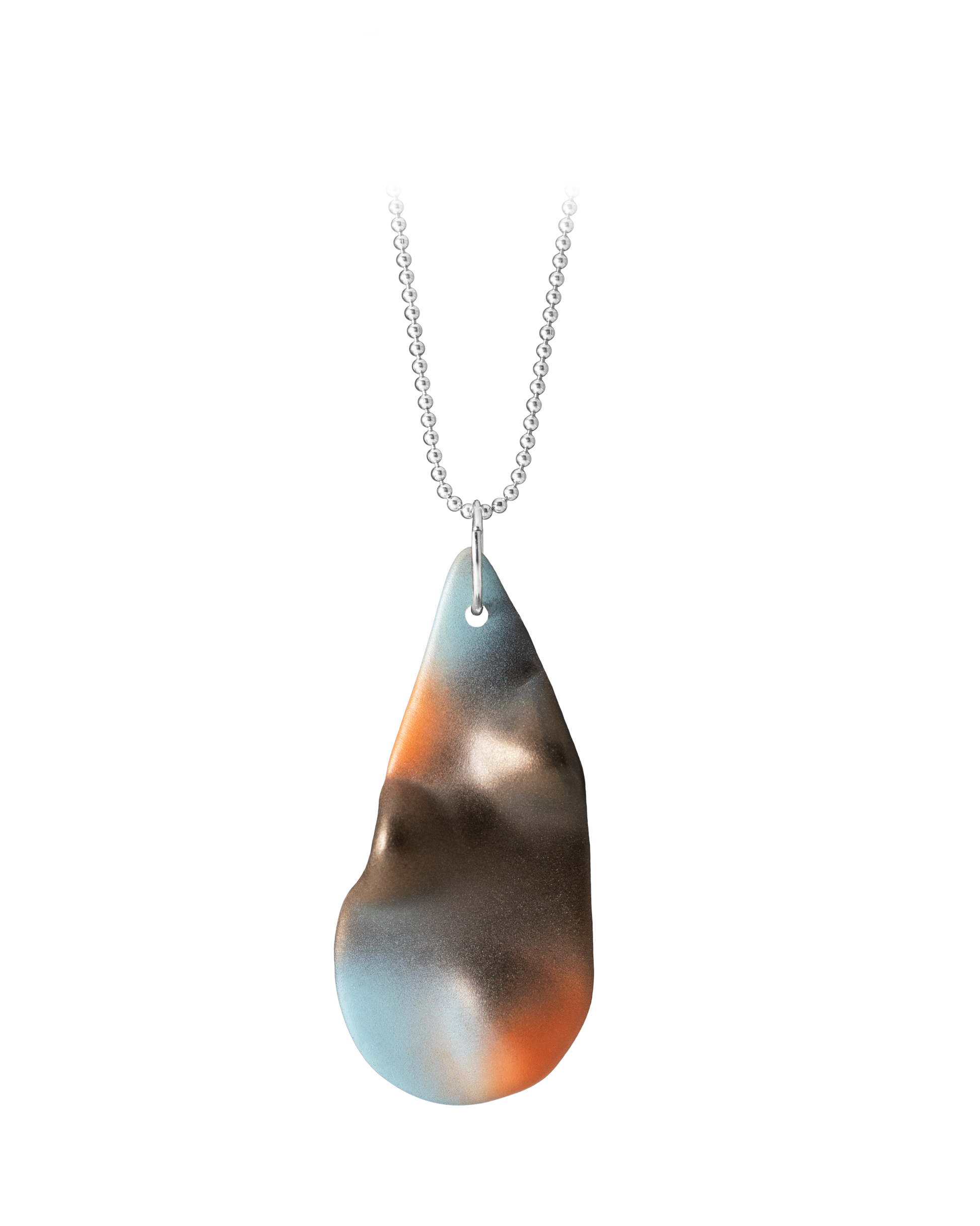 Hand-cast ceramic TOPO Teardrop necklace in Terra, featuring a topographic surface with a umber gradient with tangerine and sky blue highlights suspended on a silver ball chain.