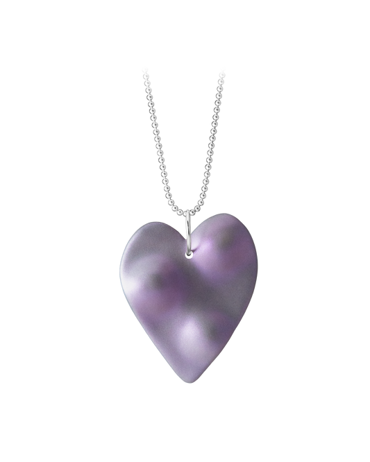 Hand-cast ceramic TOPO Heart necklace in Nebula, featuring a muted grey topographic surface veiled with shifting pearlescent violet interference pigments on a 18" sterling silver ball chain.